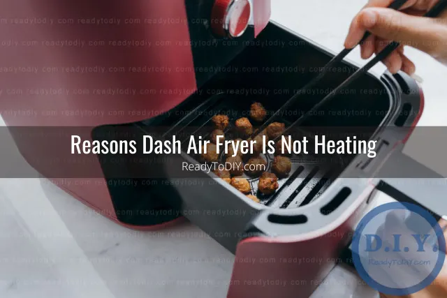 Modern air fryer in the kitchen with food inside