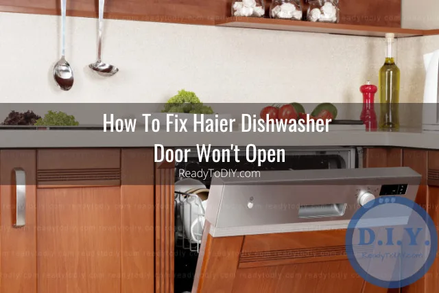 White dishwasher in the kitchen with plates inside