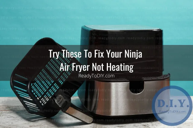 Modern air fryer in the kitchen with food inside