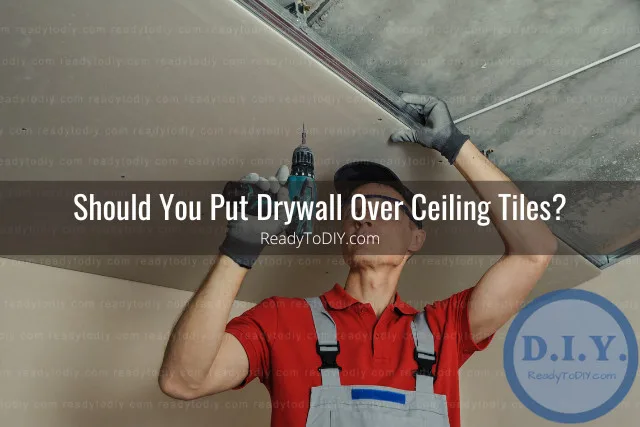 man worker fixing ceiling