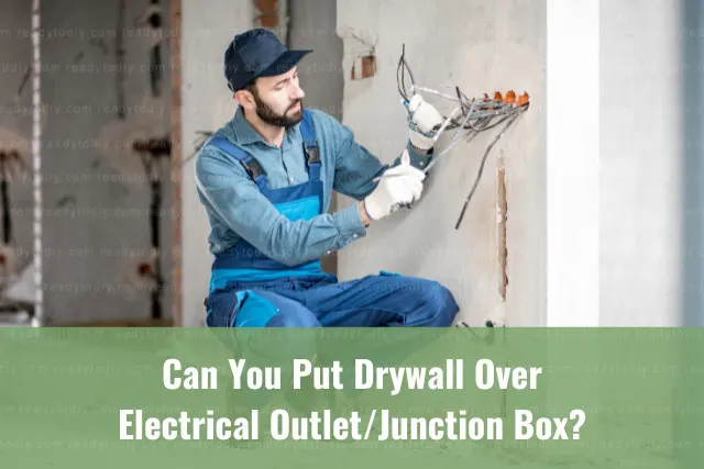 Man fixing wall outlet