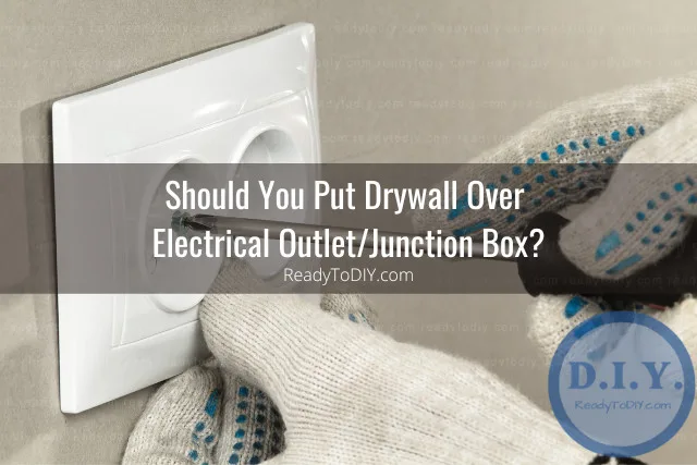 Man fixing wall outlet