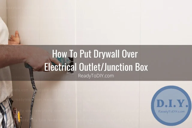 Man fixing wall outlet