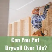 Worker man fixing the wall