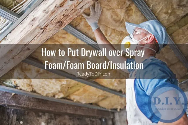 Man putting foam on the wall