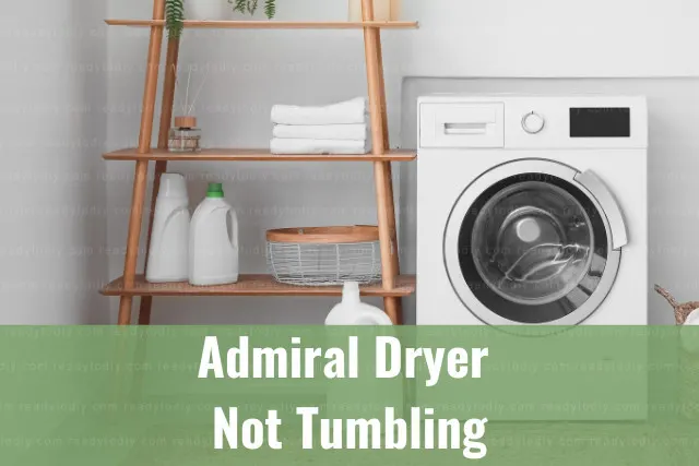 White dryer machine with clothes