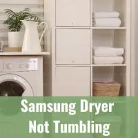 White dryer machine with clothes