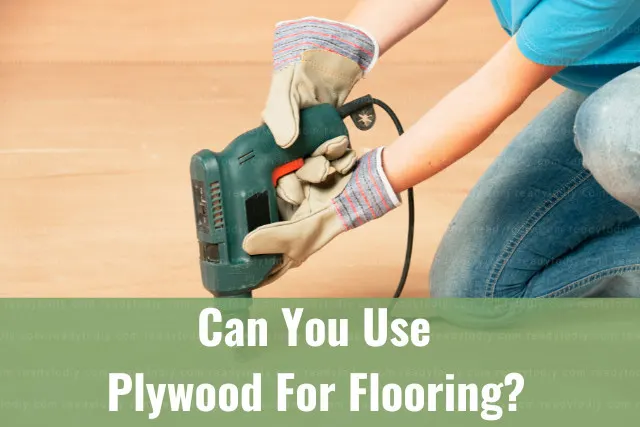 Man working on the plywood flooring