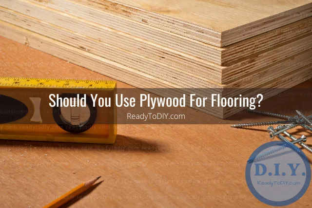 Man working on the plywood flooring