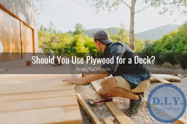 Man fixing plywood in the deck